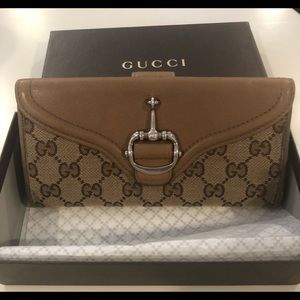 Gucci women’s trifold wallet authentic